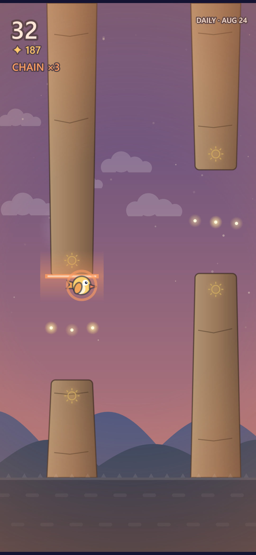Dusk: the bird grazes the tip of a hanging stone, the graze ring flaring and the chain reading three.